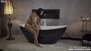 Shalina Devine indulges in a relaxing bath with a favorite anal toy