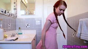 A red-haired girl takes a facial after intense anal sex from behind