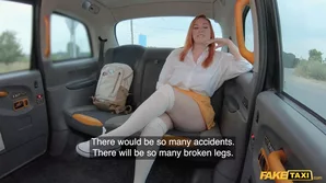 A red-haired babe with large natural breasts and buttocks has passionate sex in a taxi