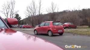 A Czech brunette enjoys a secret golden shower in a public place