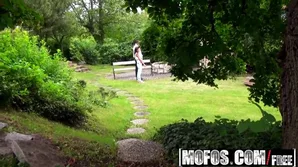 Nomi Malone, a mature woman with kinky desires, supervises her obedient partner in the garden while indulging in explicit acts including anal and oral pleasure